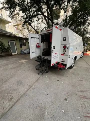Magnet Plumbing service vehicle on-site for Sewer Line Repair in Universal City